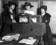 Three suffragists casting votes in 1917. (Library of Congress)